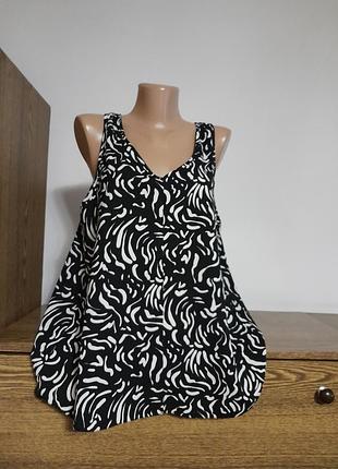 Майка гарна