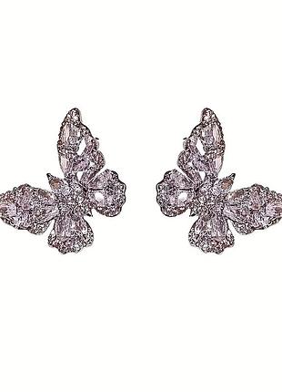 Пара блискучих сережок-метеликів