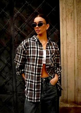 Рубашка в клетку,черно- белого цвета