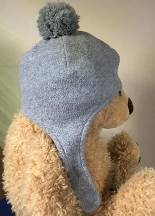 Из германии: шапка-ушанка benetton baby;мягенький полиэстер! на липучке!унисекс! 9 мес+