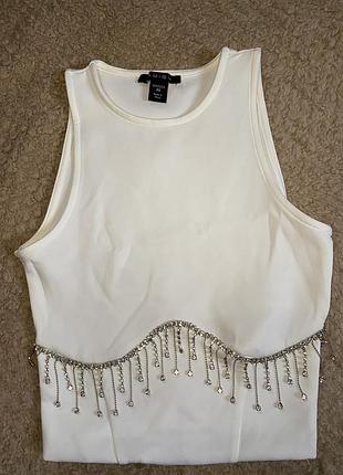 Білий топ з камінцями, розміру xs