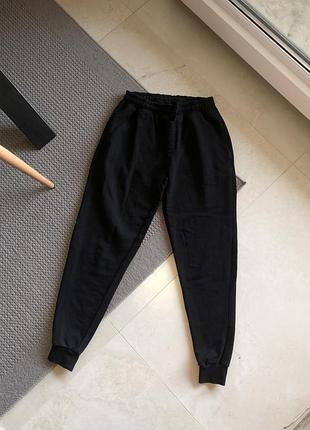 Щільні утеплені спортивні штани на манжетах плотные спортивные штаны утеплённые утеплені