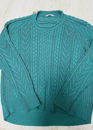 Жіночий светр в коси