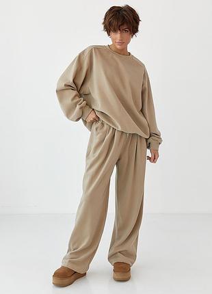 Теплий однотонний костюм зі світшотом та штанами зі складками