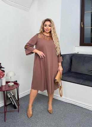 Женское платье свободного кроя с укороченным рукавом