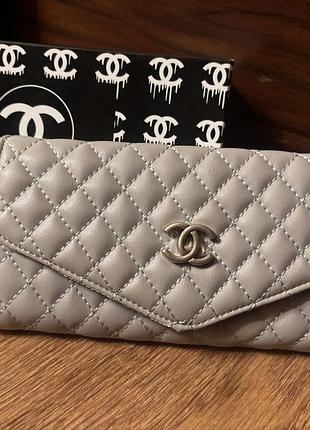 Гаманець, сірого кольору , штучна шкіра . новий.