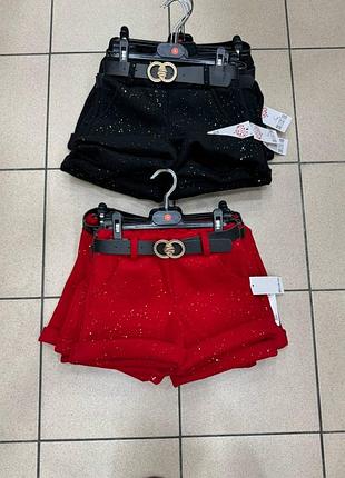 В наявності чорні темлесенькі шортики для модниць тканина шерсть з напиленням шимеру пояс в комплекті виробництво італія