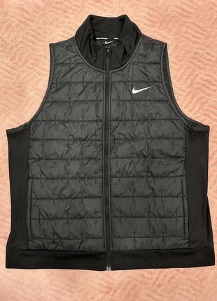 Женская жилетка