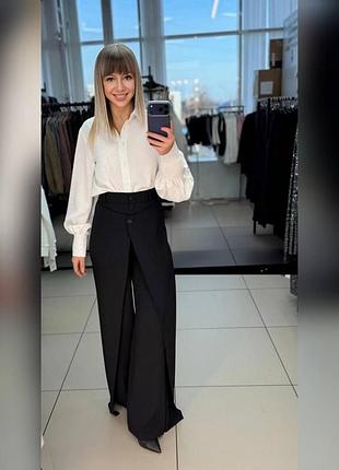Стильні широкі брюки з астметричною планкою