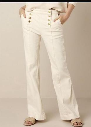 Джинси молочного кольору