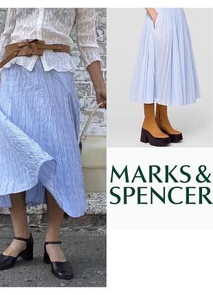 Женственная миди-юбка в нежном голубом оттенке из лёгкой фактурной ткани