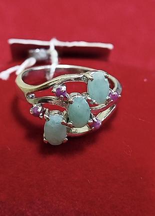 Срібний перстень з натуральними смарагдами та рубінами.