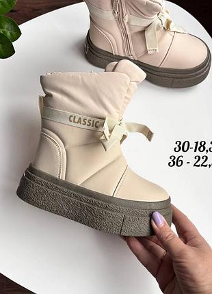 Зимові черевики на дівчинку