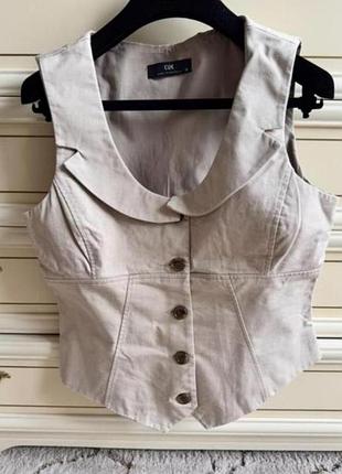 Безрукавка жилетка