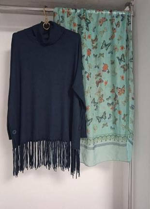 Кофточка з китицями