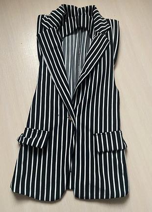 Жилетка модна