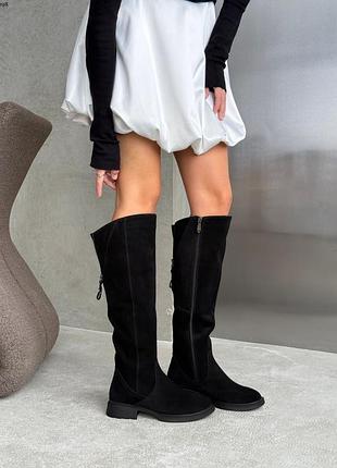 Високі чоботи