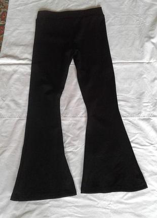 Стрейчевые трикотажные эластиковые брюки клеш  akta sport