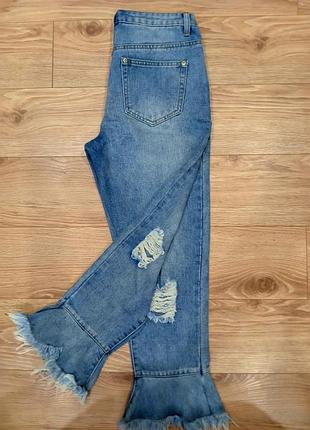 Джинси з необробленим низом