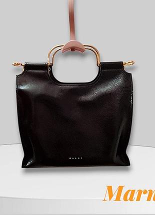 Кожаная сумка от итальянского люксового бренда marni.