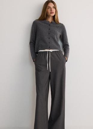 Штани сірі в смужку