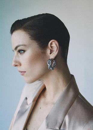 Сережки переплетені кільця  mango