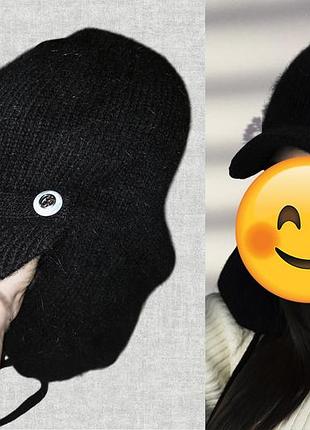 Женская вязаная модная шапка-ушанка с козырьком.