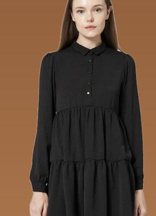 Черное платье для девочки свободного фасона