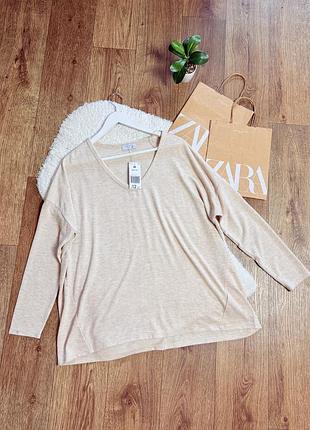 Новий бежевий пуловер