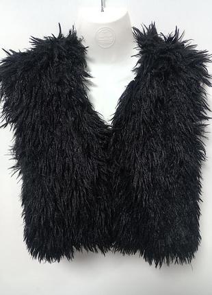 Жилетка с капюшоном.
штучне хутро