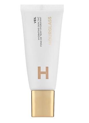 Тональна основа hourglass skin tint