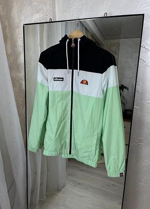 Ellesse. яскравий color block, захист від вітру