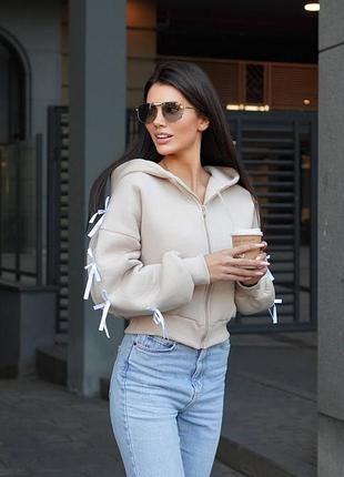 Стильне худі вільного крою декороване бантиками вздовж рукавів