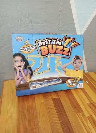 Настільна гра beat the buzz .це електронна гра на розвиток концентрації та твердості рук,