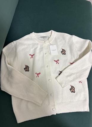 Шикарна біла кофточка на гудзиках з норічним мотивом італія