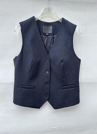 Жилетка жіноча