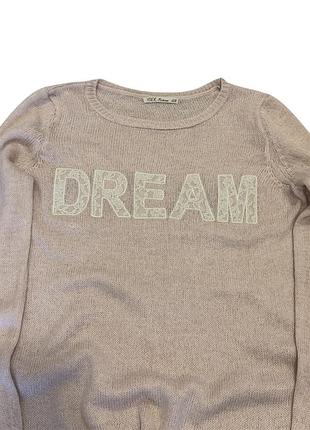 Жіночий светр у ніжному рожевому кольорі