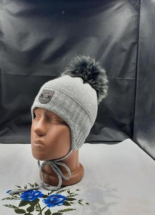 Зимняя шапочка на флисе,теплая шапка на завязках, шапочка для мальчика с бубоном