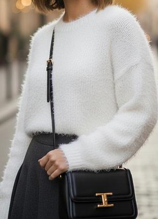 Белый теплый вязаный свитер женский нарядный с легким мерцанием sinsay