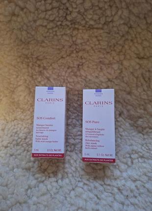 Живильна маска з олією манго для обличчя
clarins sos comfort nourishing balm mask with wild mango butter