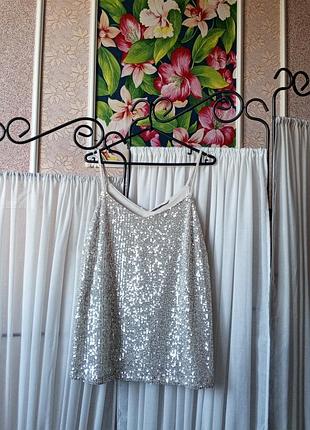 Красива блуза з паєтками tu.