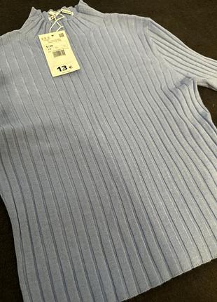 Блакитна кофтинка