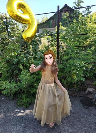 Праздничное золотистое платье на девочку
