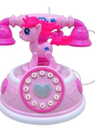 Телефон музыкальный на батарейках (розовый) [tsi260084-тsі]