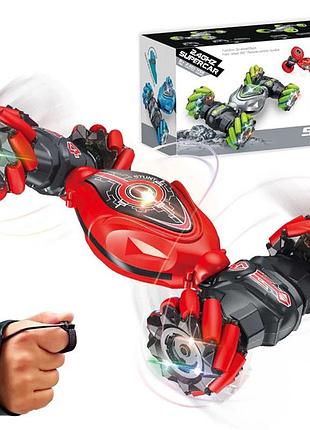 Трюковая машинка перевёртыш с браслетом и пультом управления + вращение на 360° и дрифт + музыка и led подсветка stunt car 28 см