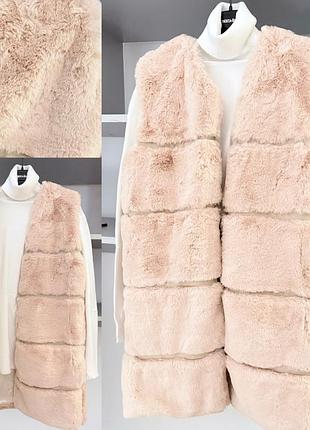 Хутряна жилетка