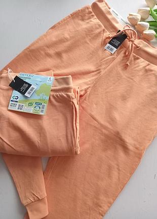 Фирменные штаны