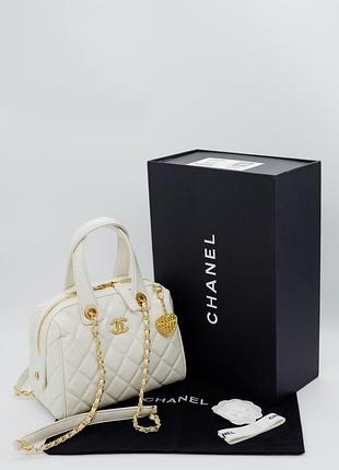 Жіноча біла шкіряна сумка