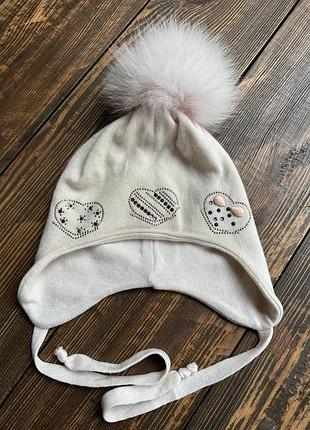 Дитяча італійська шапочка на дівчинку