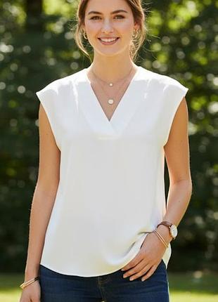 Блузка молочного цвета